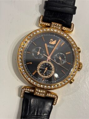 Swarovski Gold-Tone Watch with Black Strap